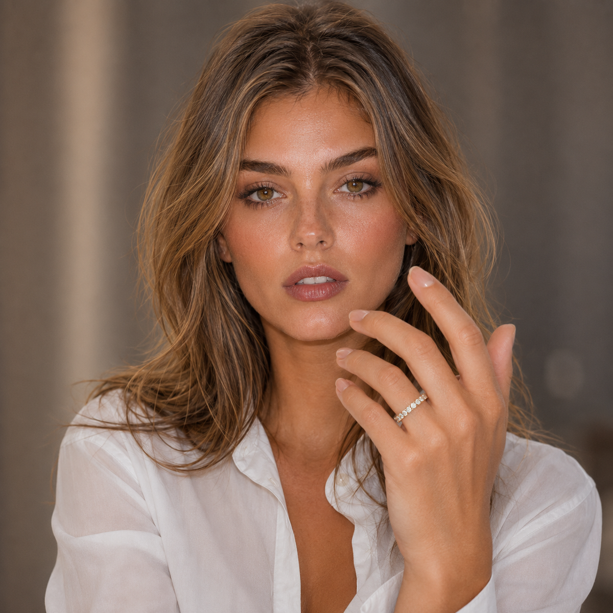 Woman wearing a white shirt with a blurred background