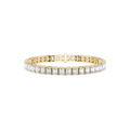 Gold bracelet with clear gemstones on a white background