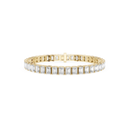 Gold bracelet with clear gemstones on a white background