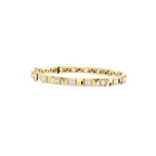Gold bracelet with diamond accents on a white background