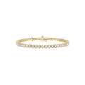 Gold bracelet with clear stones on a white background