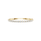 Gold ring with diamonds on a white background