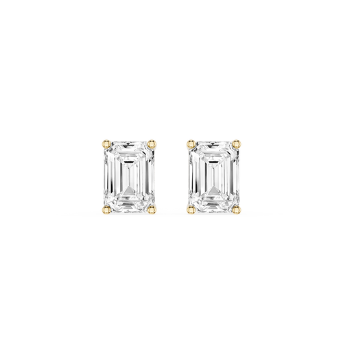 Pair of emerald-cut diamond stud earrings on a white background