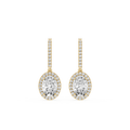 Gold and diamond earrings on a white background