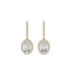 Gold and diamond earrings on a white background