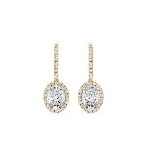 Gold and diamond earrings on a white background