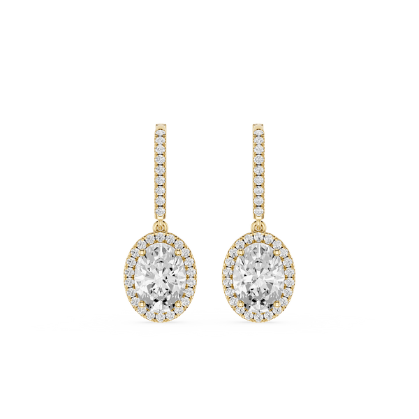 Gold and diamond earrings on a white background