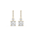 Gold and diamond earrings on a white background