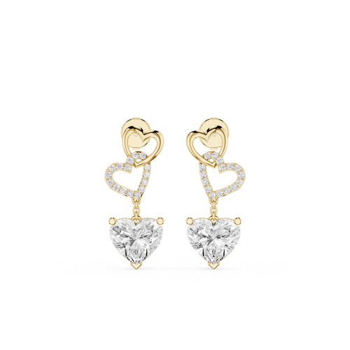 Heart-shaped earrings with gold and clear gemstones on a white background