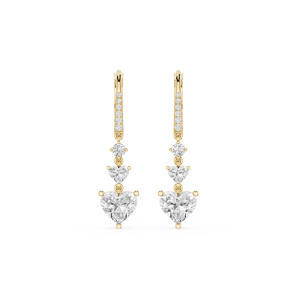 Gold and diamond earrings on a white background