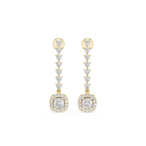 Gold and diamond earrings on a white background