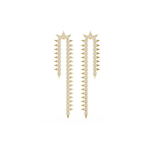 A pair of gold dangle earrings with star-shaped tops, rows of clear stones, and sharp spike details, shown on a plain white background.