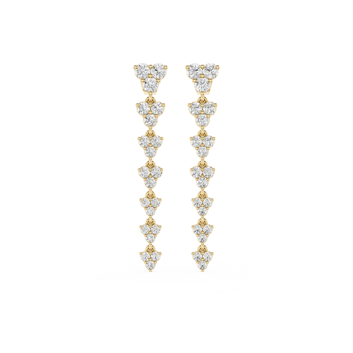 Gold and diamond earrings on a white background