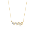 Gold necklace with clear stones on a white background