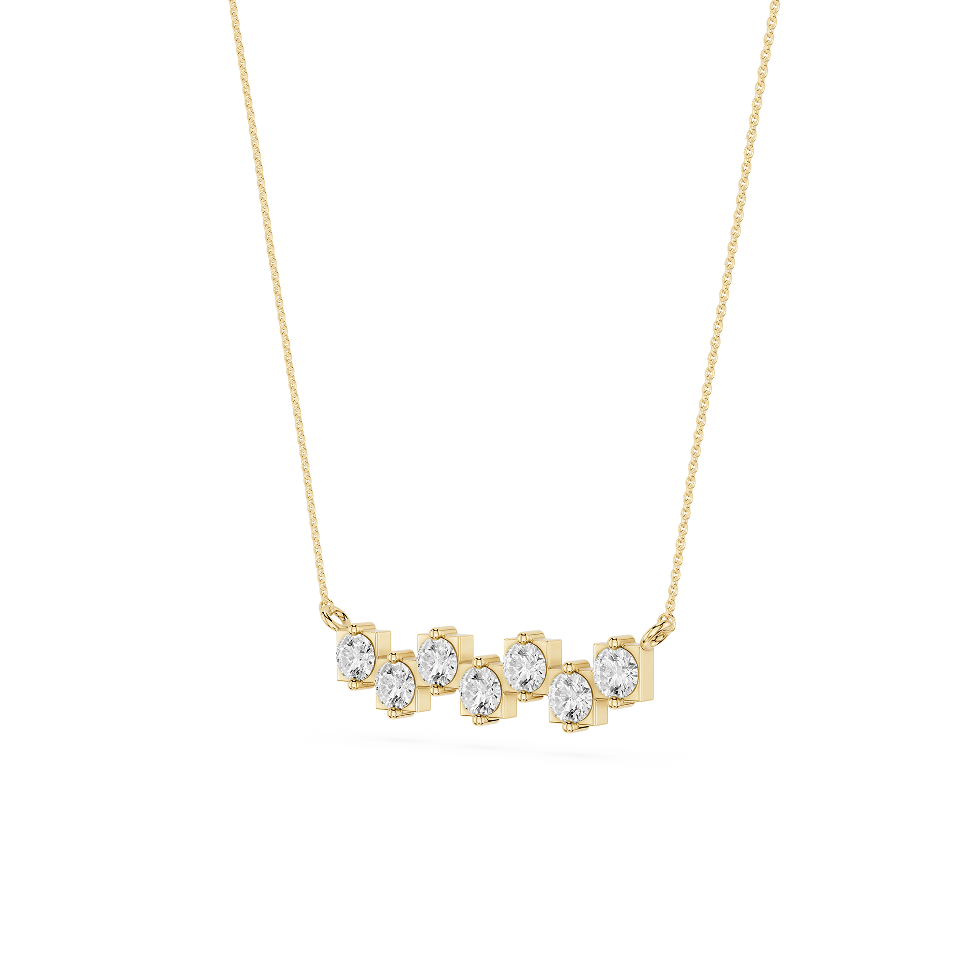 Gold necklace with clear stones on a white background