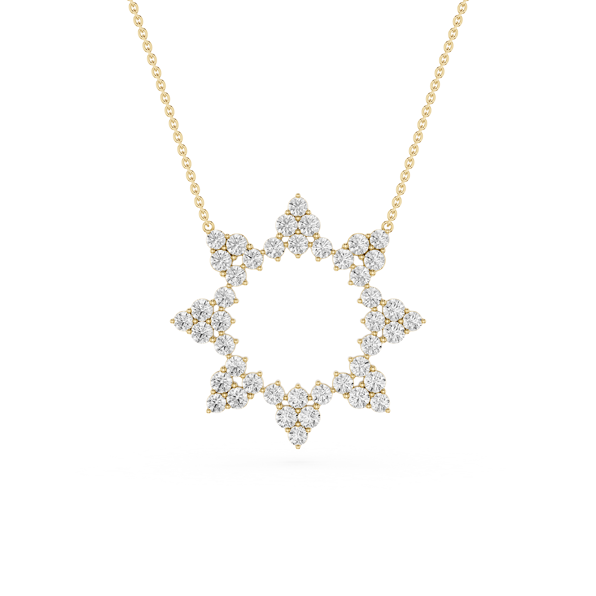 Diamond necklace with a star-shaped pendant on a gold chain against a white background