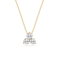 Gold necklace with a heart-shaped diamond pendant on a white background