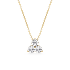Gold necklace with a heart-shaped diamond pendant on a white background
