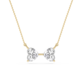 Diamond necklace with bow design on a white background