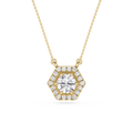 Gold necklace with a hexagonal diamond pendant on a white background