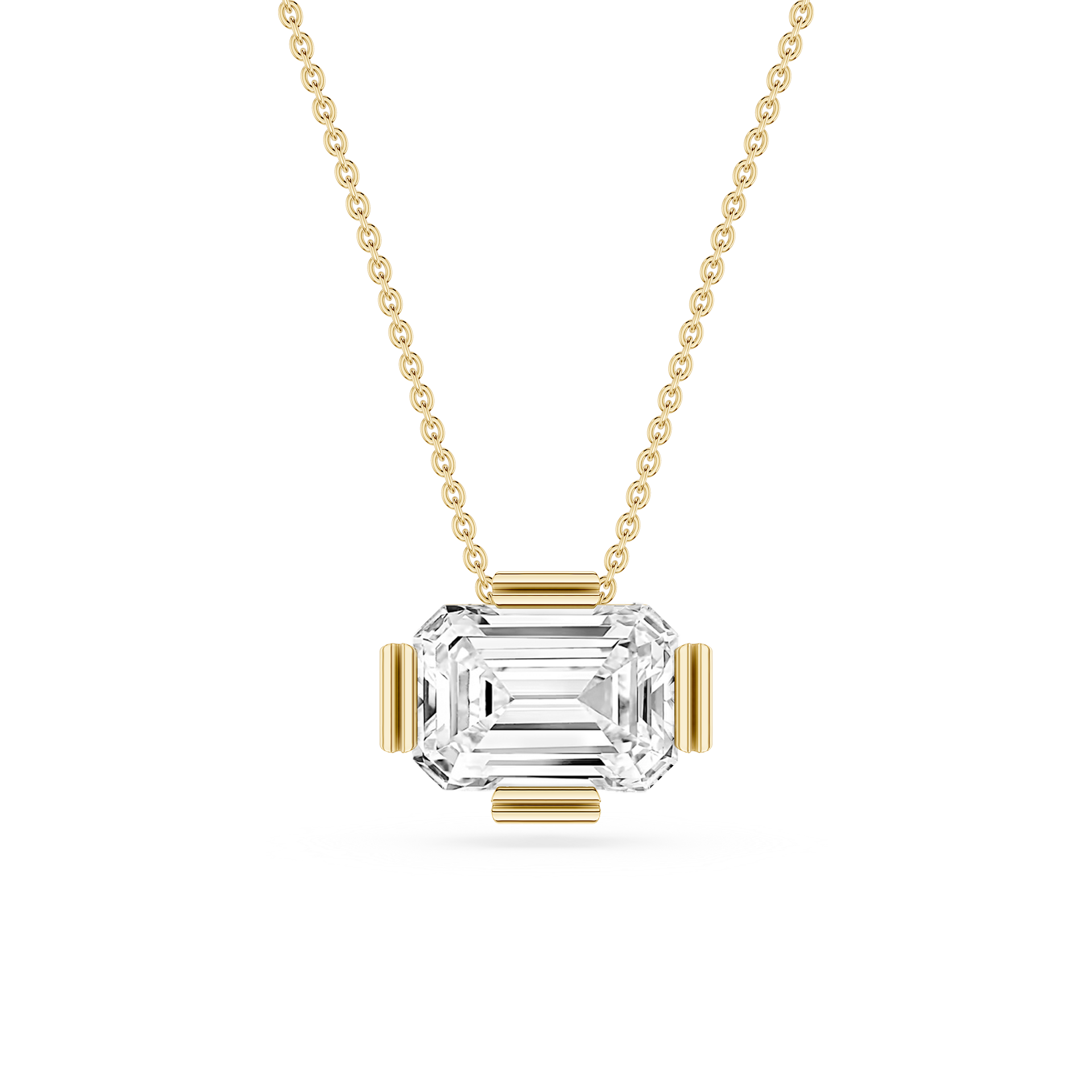 Gold necklace with a clear gemstone pendant on a white background