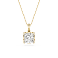 Gold pendant necklace with a clear gemstone on a white background