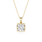 Gold pendant necklace with a clear gemstone on a white background