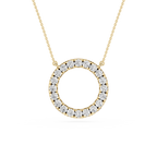 Gold necklace with a circular pendant featuring diamonds on a white background