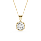 Gold necklace with a round diamond pendant on a white background