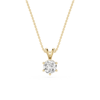 Gold necklace with a diamond pendant on a white background