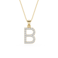 A gold initial pendant necklace featuring the letter 'B' paved with small clear stones, suspended from a delicate gold chain against a plain white background.