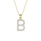 A gold initial pendant necklace featuring the letter 'B' paved with small clear stones, suspended from a delicate gold chain against a plain white background.