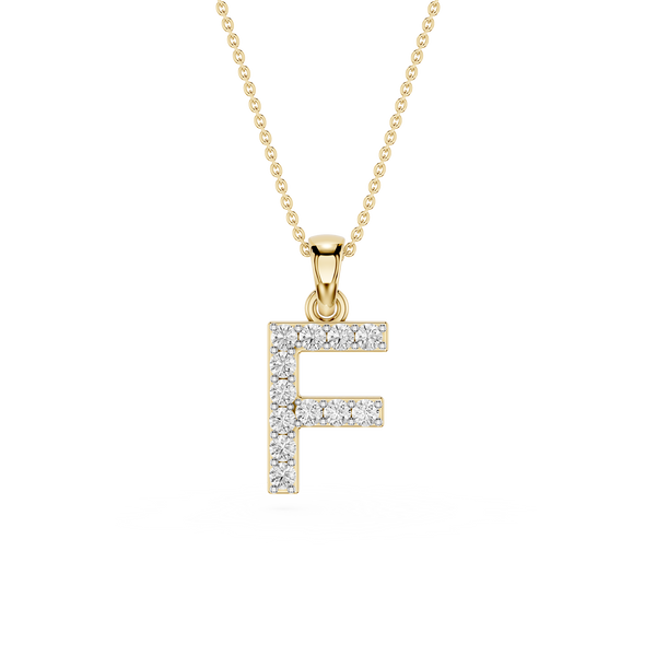 A gold initial pendant necklace featuring the letter 'F' paved with small clear stones, suspended from a delicate gold chain on a white background.