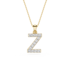Gold necklace with a diamond-studded letter 'Z' pendant on a white background