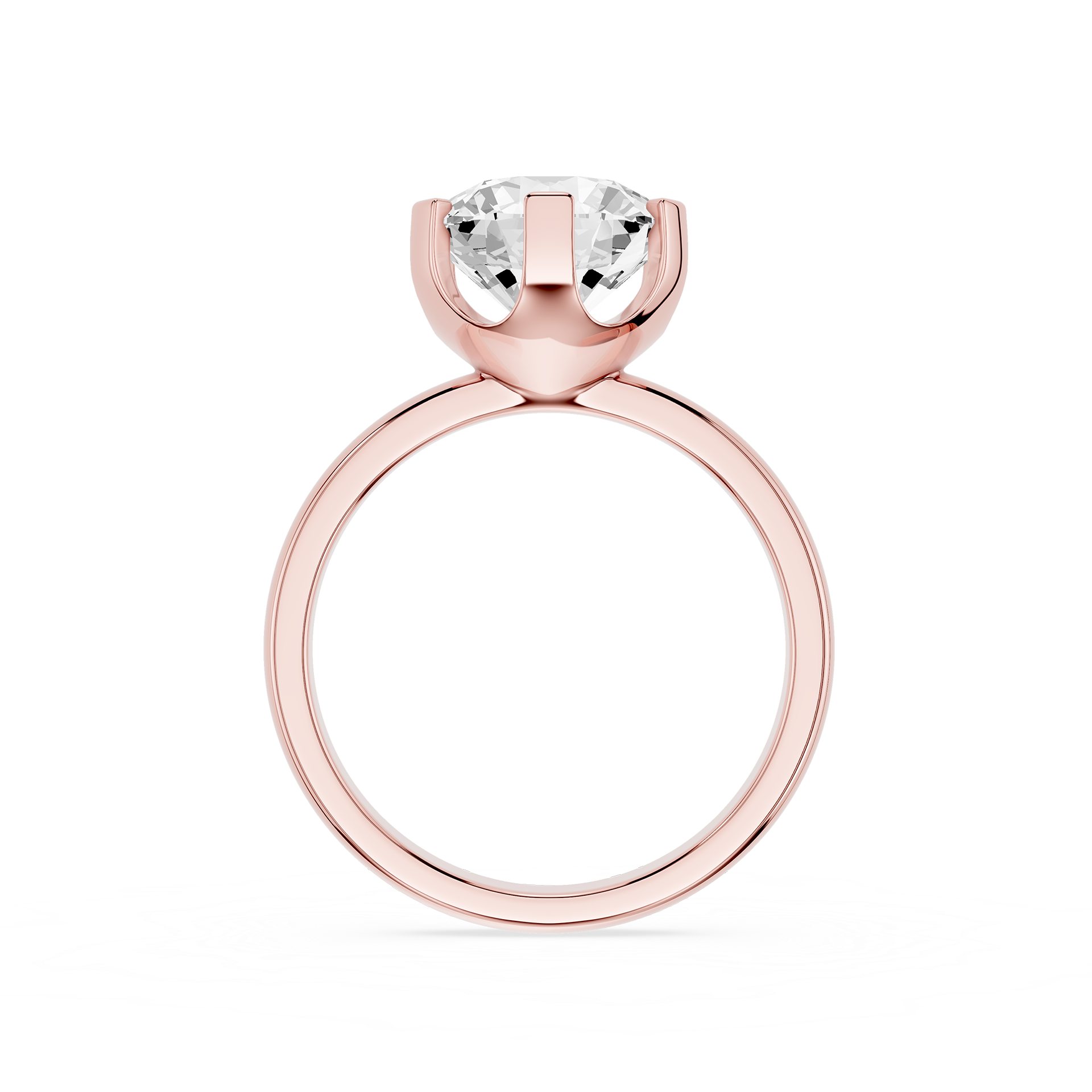 Gold ring with a clear gemstone on a white background