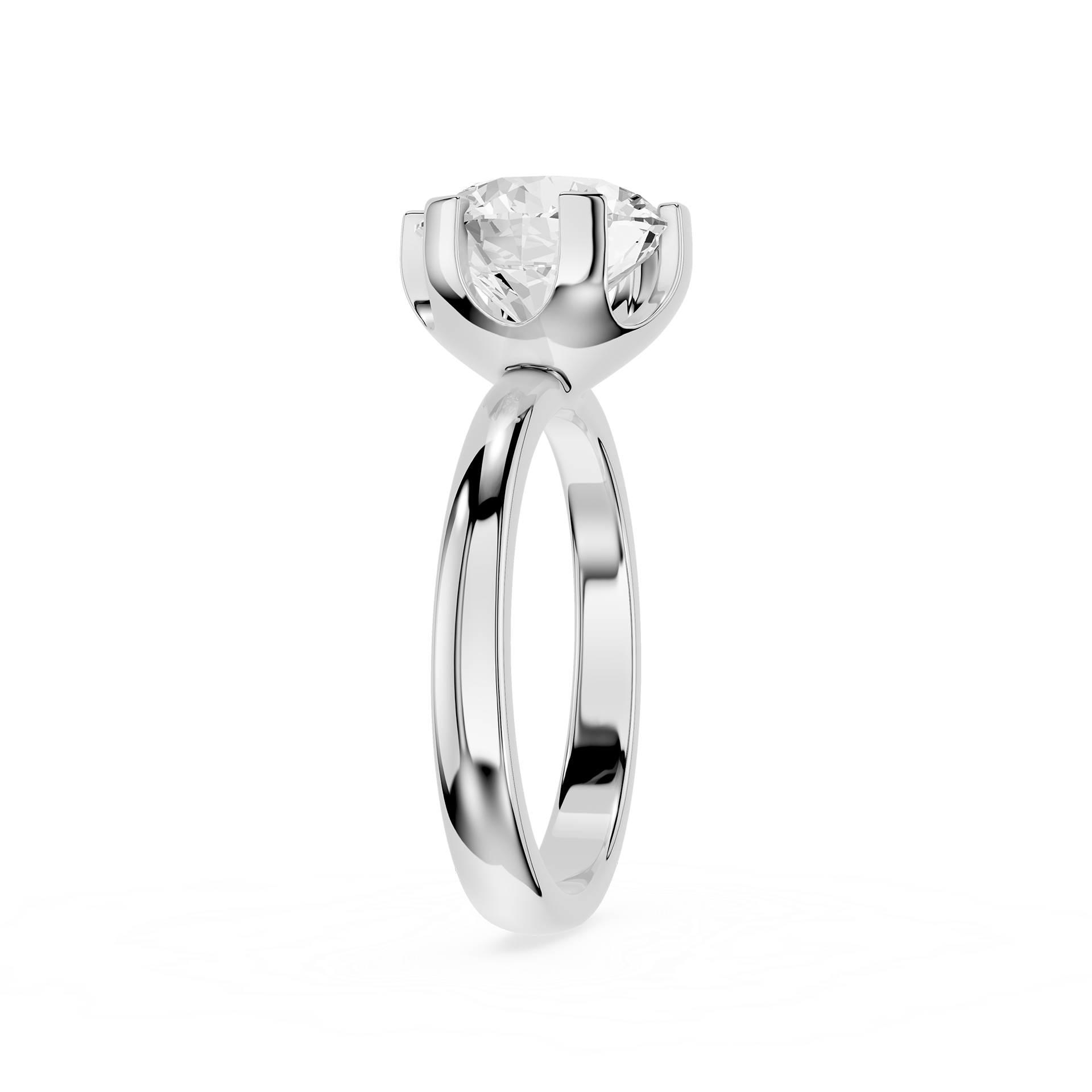 Rose gold ring with a clear gemstone on a white background