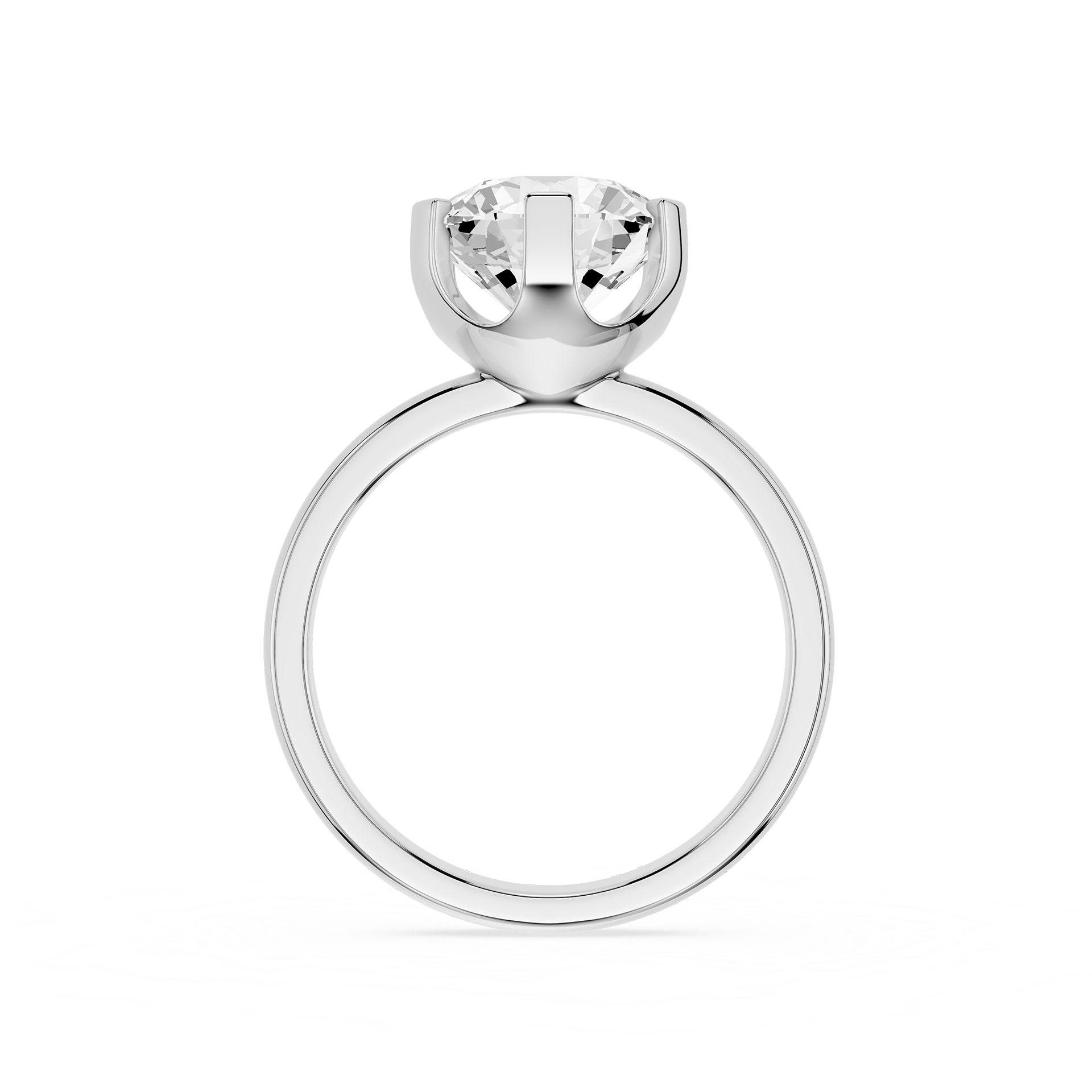 Gold ring with a clear gemstone on a white background