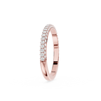 Rose gold ring with diamonds on a white background