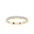 Gold ring with diamond accents on a white background