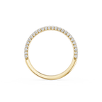 Gold ring with diamond accents on a white background