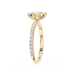 marquise Gold ring with diamond accents on a white background