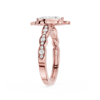 Rose gold ring with diamonds on a white background