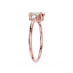 Rose gold ring with a diamond on a white background