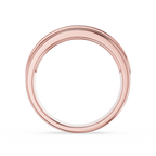 Rose gold ring on a white background