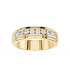 Gold ring with embedded diamonds on a white background