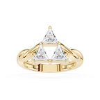 Gold ring with triangular diamond design on a white background