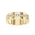 Gold ring with diamonds on a white background