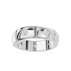 Silver ring with embedded diamonds on a white background