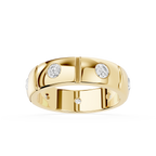 Gold ring with embedded diamonds on a white background