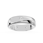 Silver ring with embedded diamonds on a white background